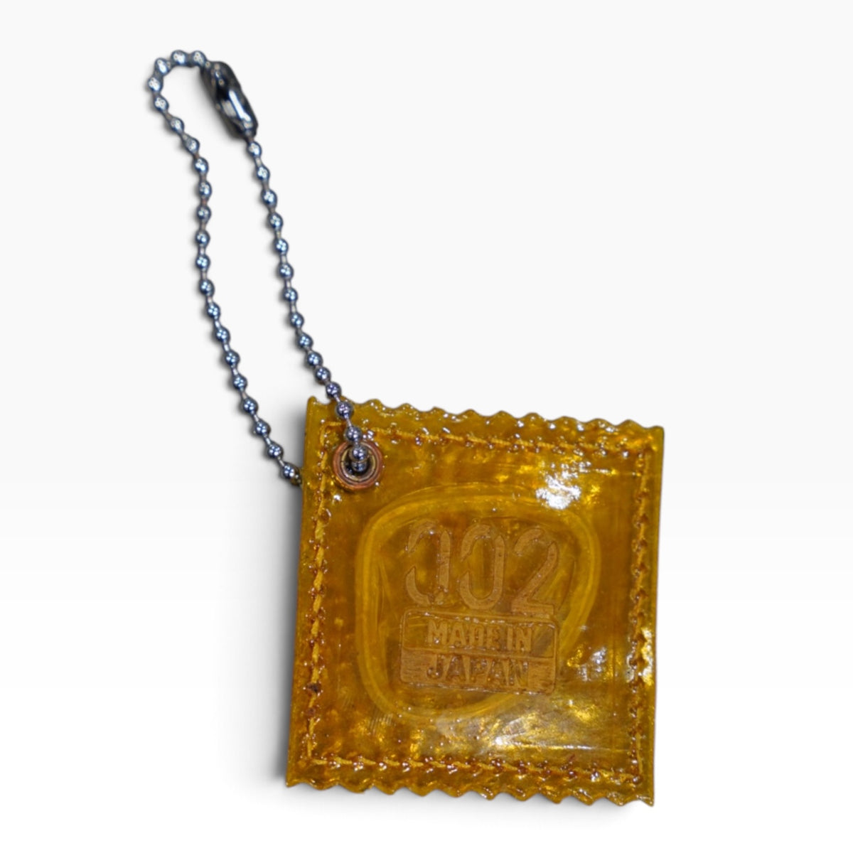 RAW PIG SKIN CONDOM CHARM FOR BAG / YELLOW