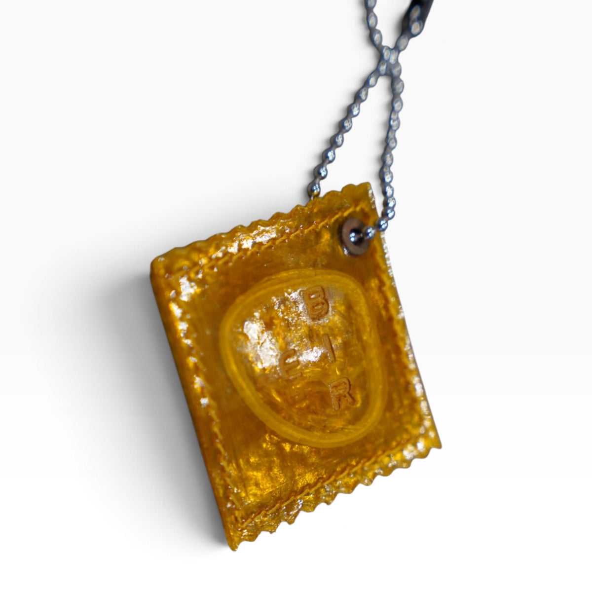 RAW PIG SKIN CONDOM CHARM FOR BAG / YELLOW