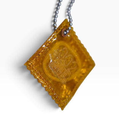 RAW PIG SKIN CONDOM CHARM FOR BAG / YELLOW